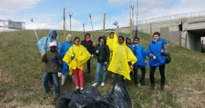 Youth take part in litter clean up in Fish Creek.